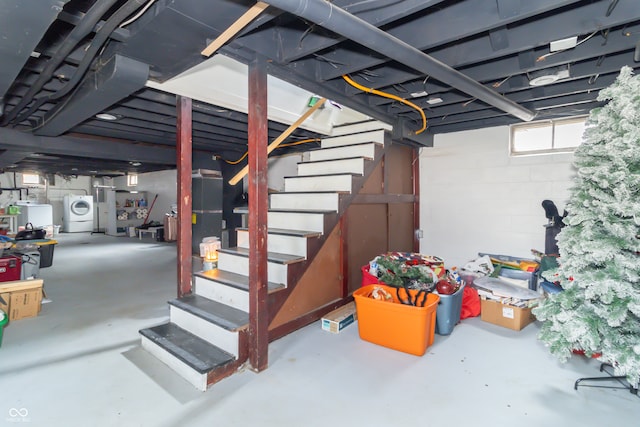 basement with separate washer and dryer