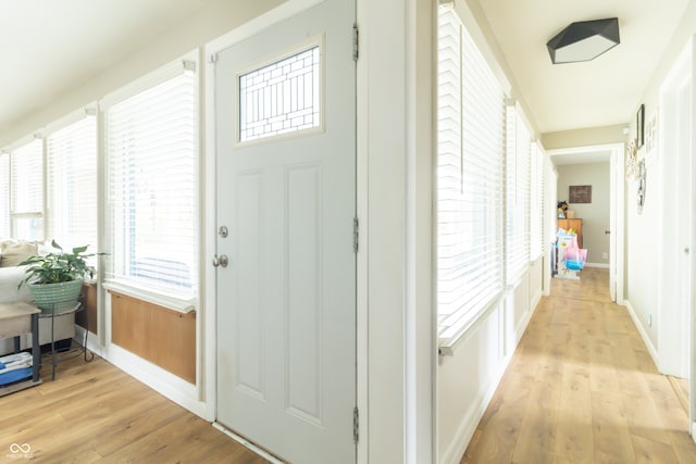 foyer entrance featuring light wood-type flooring