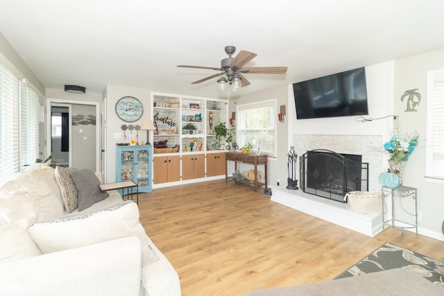 living room featuring wine cooler, hardwood / wood-style flooring, and ceiling fan