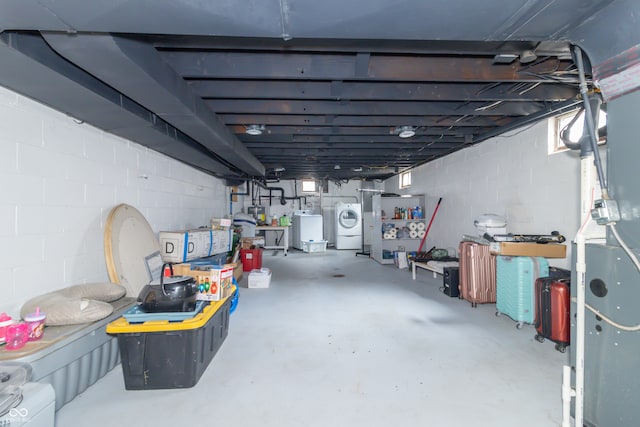 basement featuring separate washer and dryer