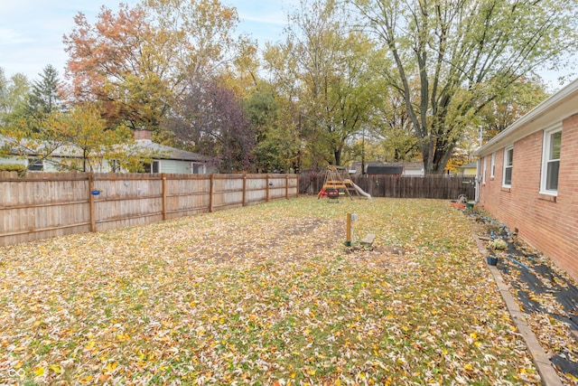 view of yard with a playground