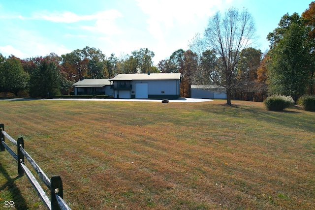 view of yard with a garage