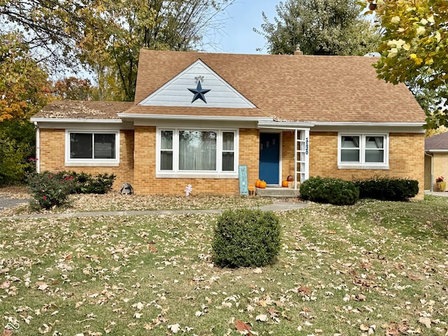 view of front of home with a front yard