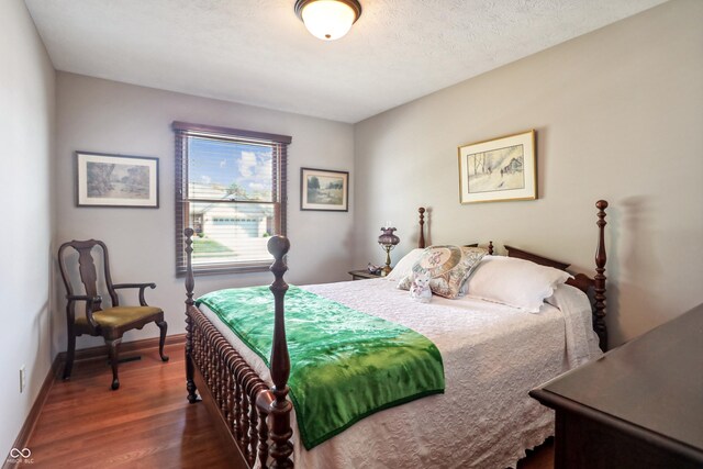 3784 Mansfield Dr, Brownsburg, IN 46112 - bedroom featuring wood finished floors and baseboards