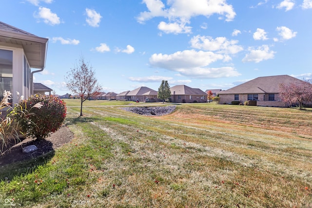 3784 Mansfield Dr, Brownsburg, IN 46112 - view of grassy yard with a residential view