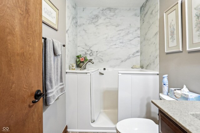 3784 Mansfield Dr, Brownsburg, IN 46112 - bathroom with vanity, toilet, and a shower