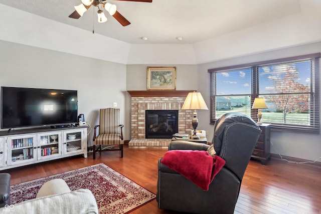 3784 Mansfield Dr, Brownsburg, IN 46112 - living area featuring wood-type flooring, a ceiling fan, baseboards, and a fireplace