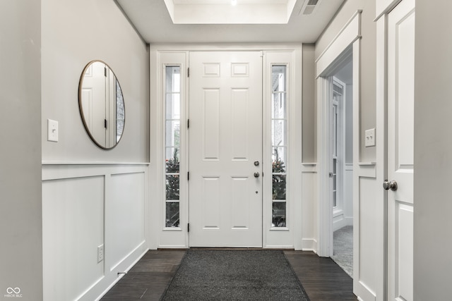 entrance foyer with dark hardwood / wood-style floors