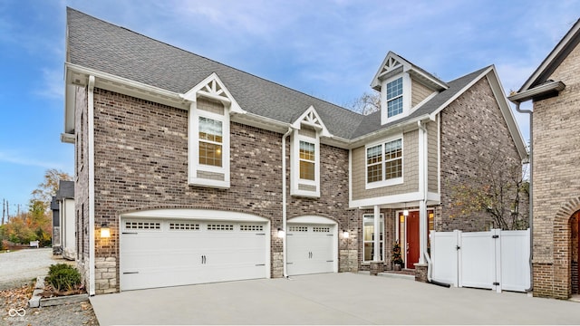 view of front of property featuring a garage