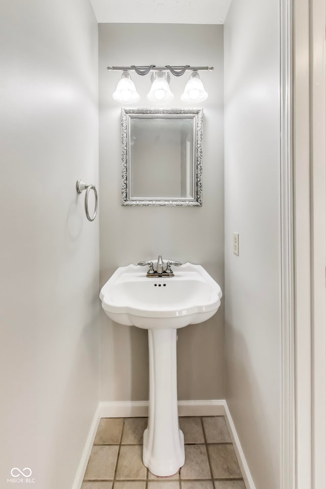 bathroom featuring tile patterned flooring