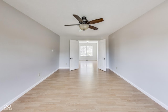 534 Austrian Way, Avon, IN 46123 - spare room with ceiling fan, light wood-style flooring, and baseboards