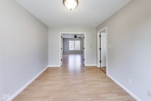 hallway featuring light hardwood / wood-style flooring