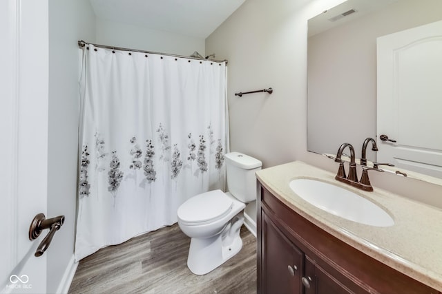 534 Austrian Way, Avon, IN 46123 - full bath with wood finished floors, vanity, toilet, and a shower with shower curtain