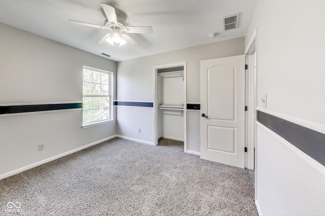 534 Austrian Way, Avon, IN 46123 - unfurnished bedroom featuring carpet, a closet, baseboards, and a ceiling fan