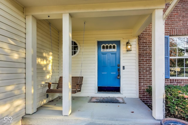 534 Austrian Way, Avon, IN 46123 - view of exterior entry featuring brick siding and a porch