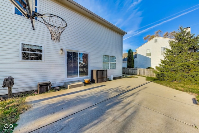 back of property featuring a patio