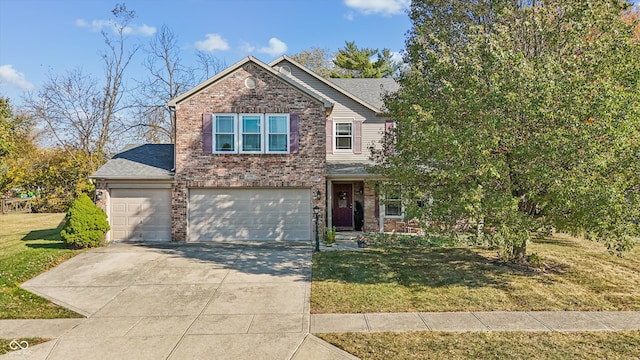 view of front of house featuring a garage and a front yard