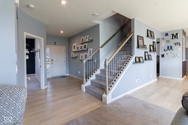 foyer entrance featuring light hardwood / wood-style floors