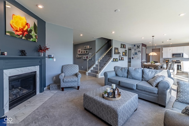 living room featuring a fireplace