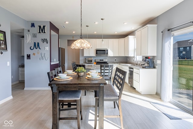 dining area featuring light hardwood / wood-style floors