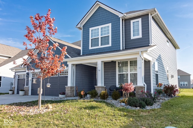 craftsman-style home featuring a porch, a garage, and a front lawn