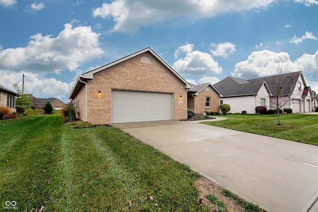 view of front of house featuring a garage and a front yard