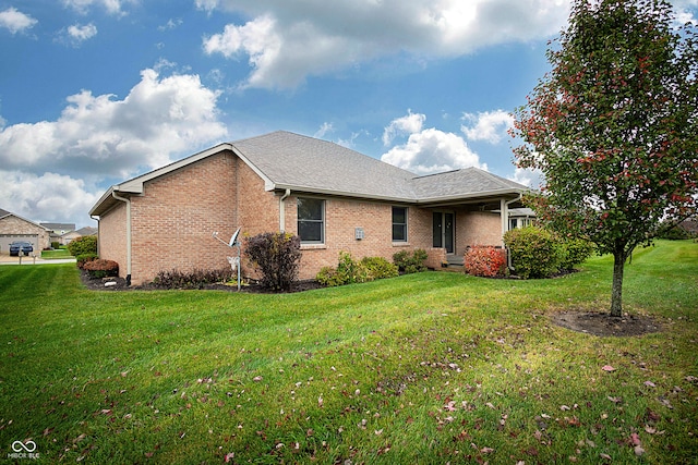 exterior space featuring a lawn