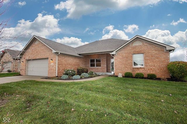 view of front facade with a garage and a front yard