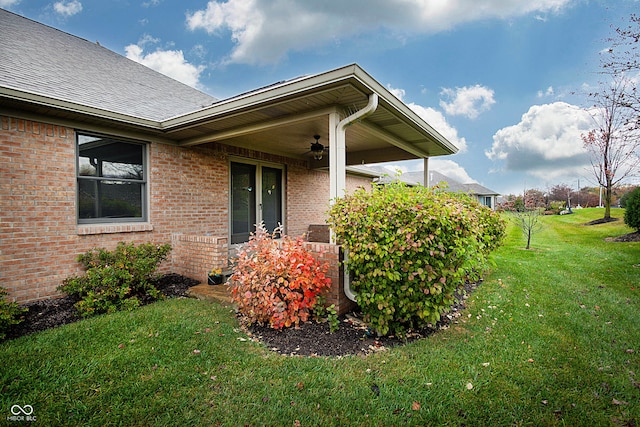 property entrance with a yard