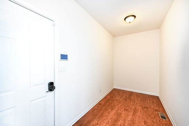 interior space with dark hardwood / wood-style flooring