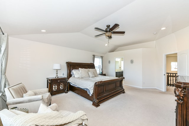 bedroom featuring ceiling fan, lofted ceiling, and light colored carpet