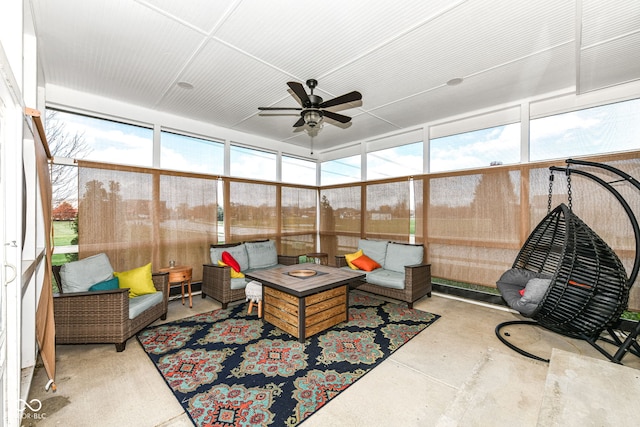 sunroom / solarium with ceiling fan and a wealth of natural light