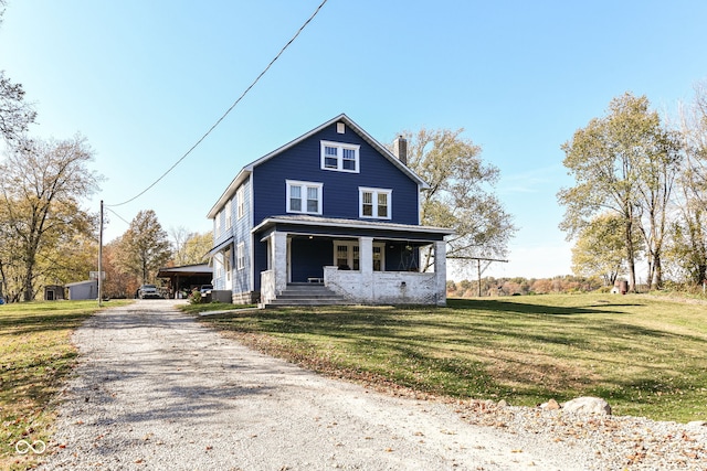 view of front of property with a front lawn and a porch