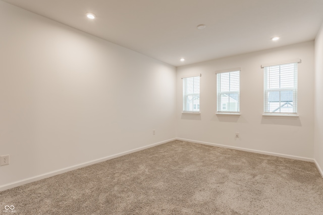 unfurnished room with carpet