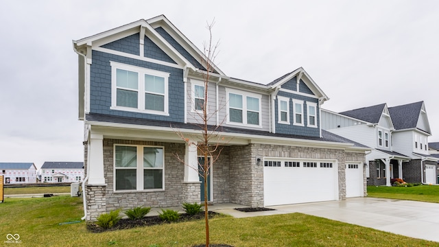 view of front facade with a front lawn and a garage