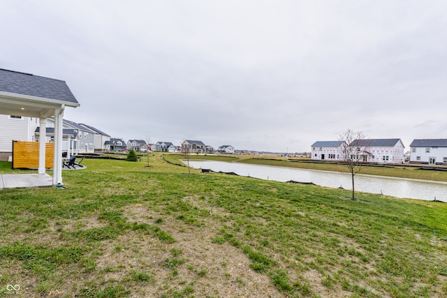 view of yard with a water view