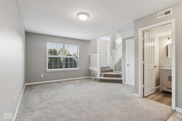 empty room with light carpet