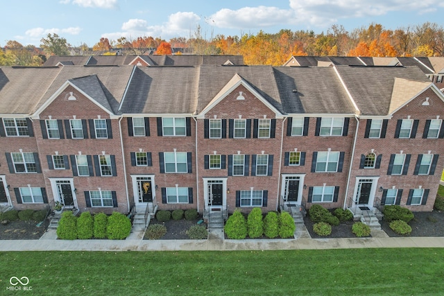 exterior space with a front lawn