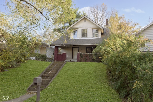 view of front of property with a front lawn