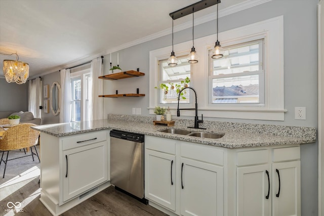 kitchen with dark hardwood / wood-style flooring, white cabinets, light stone counters, sink, and dishwasher