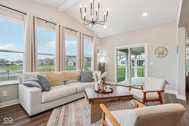 living room with vaulted ceiling with beams, dark wood-type flooring, and a wealth of natural light