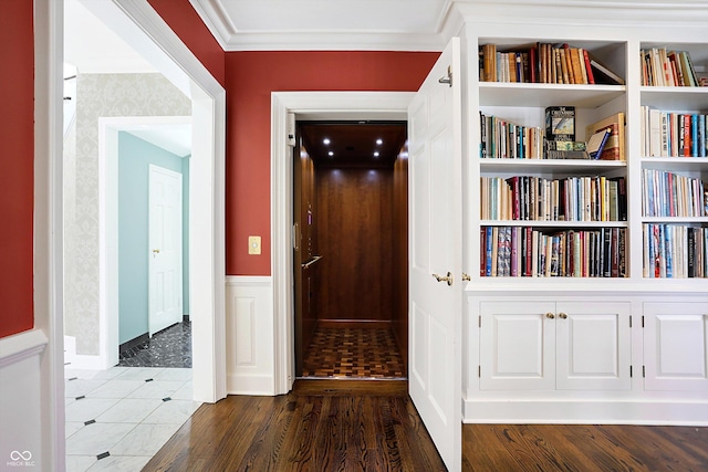 corridor with crown molding and dark hardwood / wood-style floors