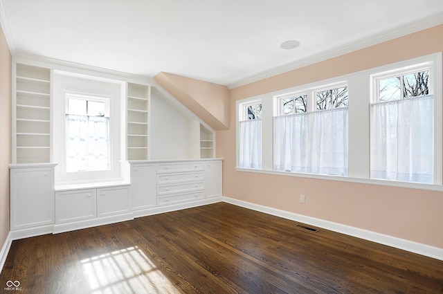 2505 Riverside Dr, Columbus, IN 47201 - additional living space featuring baseboards, dark wood-type flooring, and built in shelves