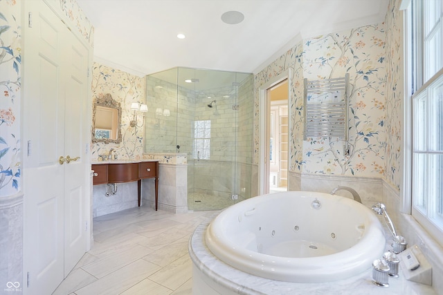 2505 Riverside Dr, Columbus, IN 47201 - bathroom featuring wallpapered walls, a stall shower, a tub with jets, vanity, and healthy amount of natural light