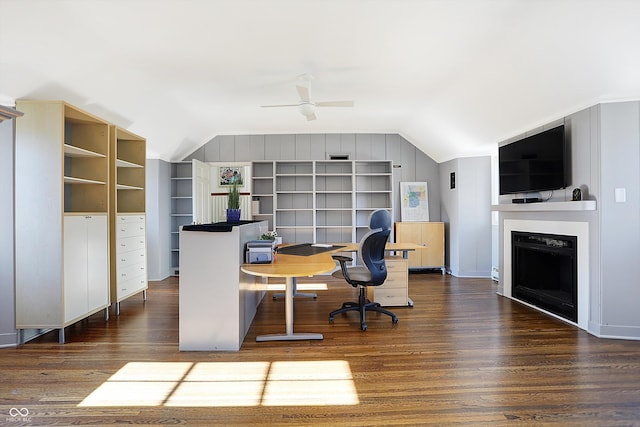 office area featuring ceiling fan, dark hardwood / wood-style flooring, built in features, and vaulted ceiling