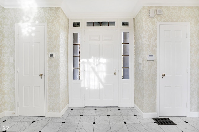 entrance foyer with crown molding