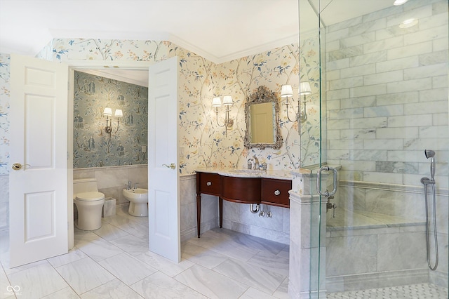 bathroom featuring a shower with door, a bidet, toilet, ornamental molding, and tile walls