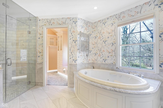 2505 Riverside Dr, Columbus, IN 47201 - bathroom featuring a tub with jets, plenty of natural light, a stall shower, wallpapered walls, and marble finish floors