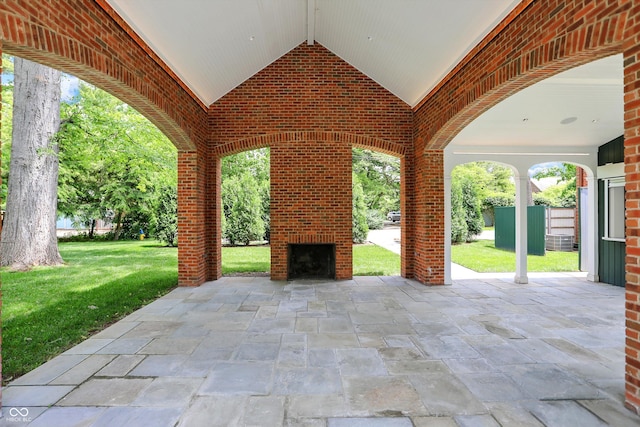 2505 Riverside Dr, Columbus, IN 47201 - view of patio / terrace featuring an outdoor brick fireplace
