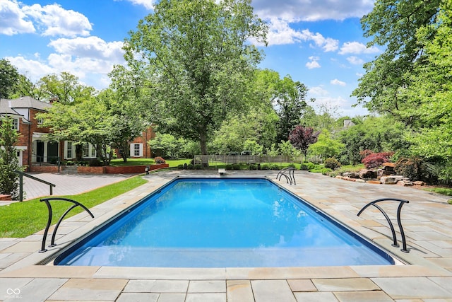2505 Riverside Dr, Columbus, IN 47201 - outdoor pool with a patio area and view of scattered trees